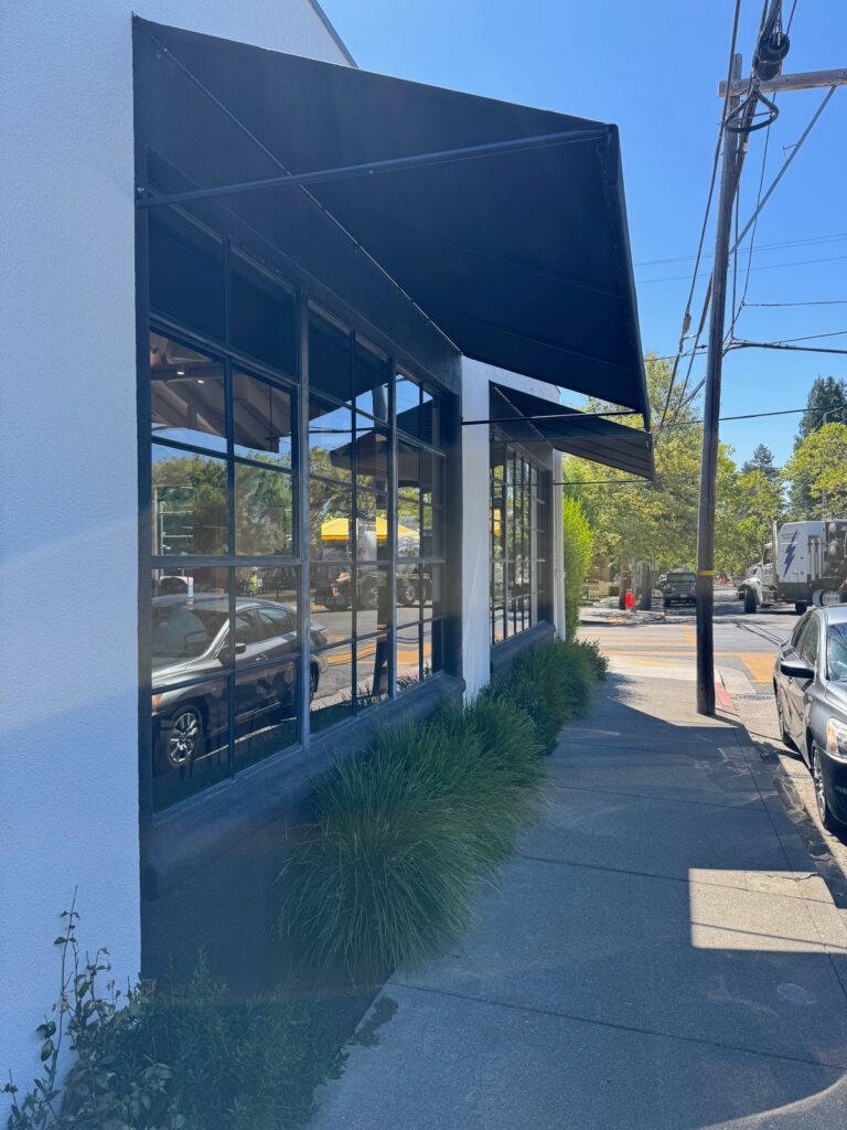 picture of street view of Sam's General Store in St. Helena.